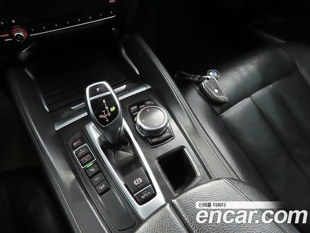 BMW X6 (F16) xDrive 30d 2015 — фото 9
