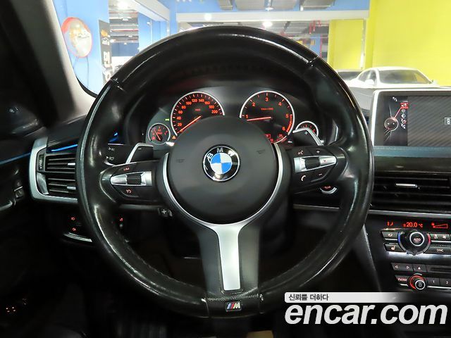BMW X6 (F16) xDrive 30d 2015 — фото 19