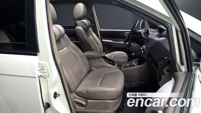 KG Mobility (SsangYong) Korando Turismo 4WD GT 9-seater 2014 — фото 11