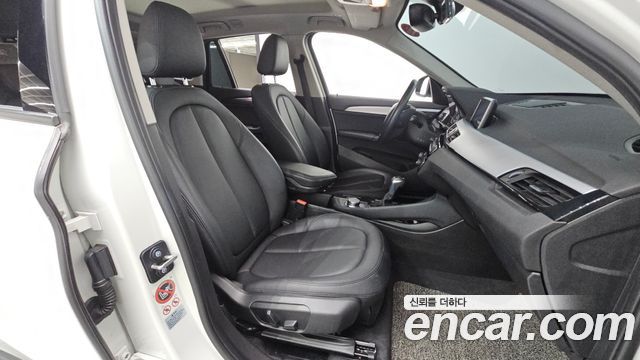 BMW X1 (F48) xDrive 18d 2016 — фото 11