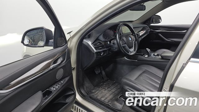 BMW X6 (F16) xDrive 30d 2016 — фото 12