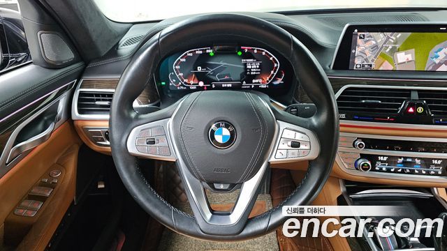 BMW 7 Series (G11) 740Li xDrive Design Pure Excellence 2020 — фото 13