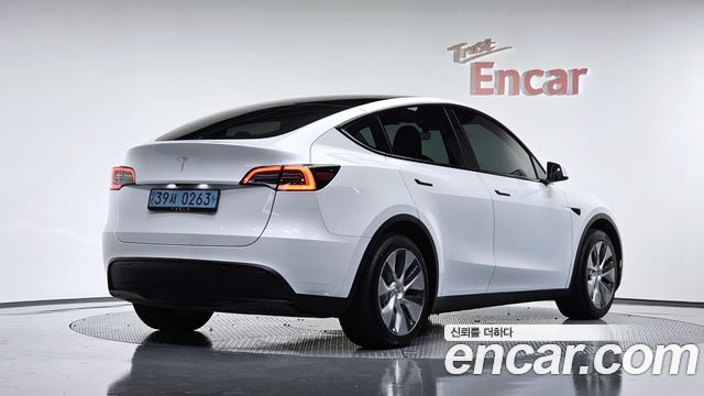 Tesla Model Y RWD 2024 — фото 2