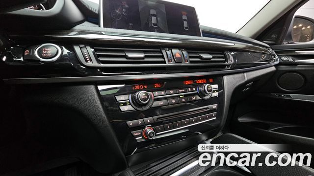 BMW X6 (F16) xDrive 30d 2015 — фото 14