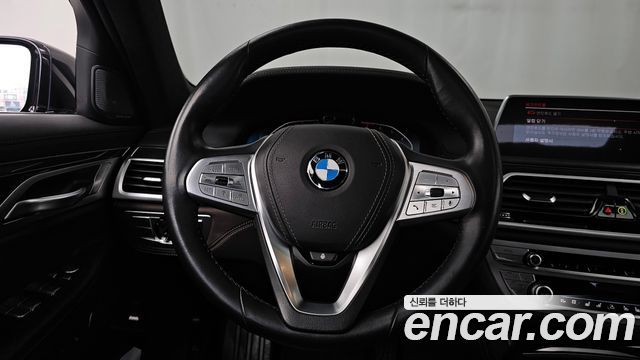 BMW 7 Series (G11) 740Li xDrive Design Pure Excellence 2021 — фото 13