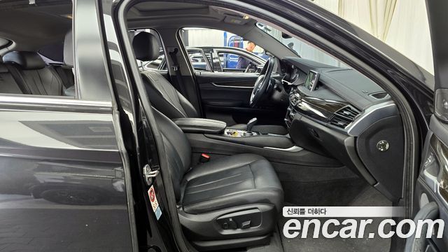 BMW X6 (F16) xDrive 30d 2015 — фото 11