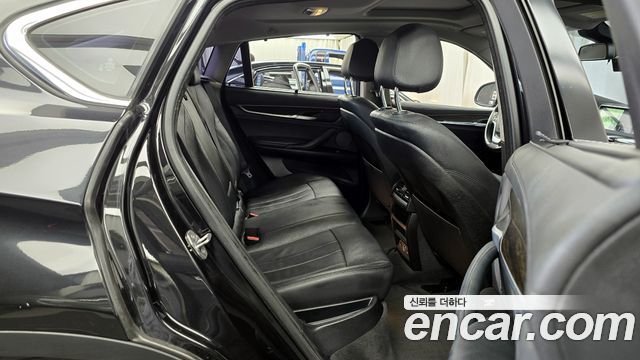 BMW X6 (F16) xDrive 30d 2015 — фото 12