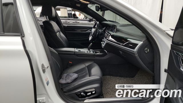BMW 7 Series (G11) 740d xDrive M Sport 2018 — фото 11