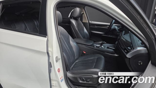 BMW X6 (F16) xDrive 30d 2015 — фото 12