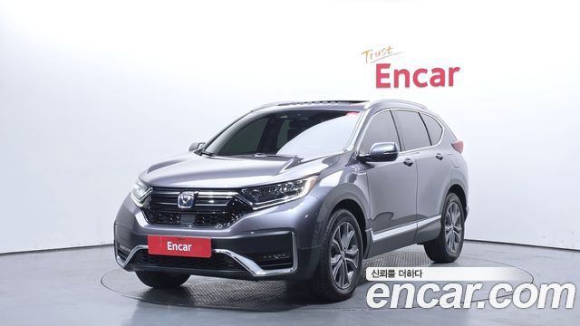Honda CR-V (V) 2.0 Hybrid Touring 4WD 2021 — фото 1