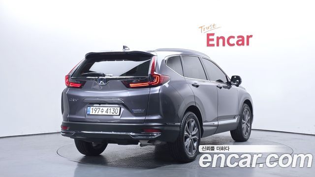 Honda CR-V (V) 2.0 Hybrid Touring 4WD 2021 — фото 2