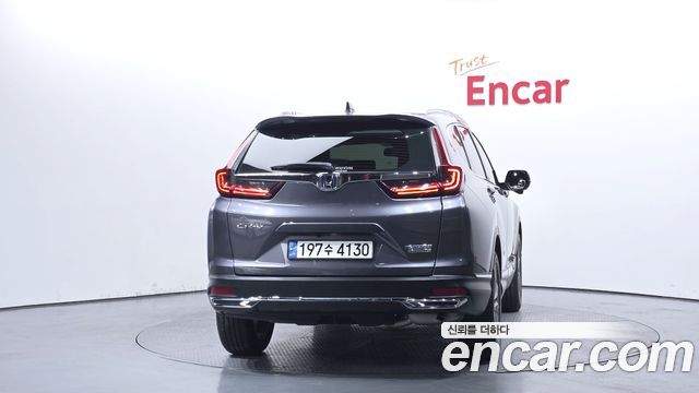 Honda CR-V (V) 2.0 Hybrid Touring 4WD 2021 — фото 4