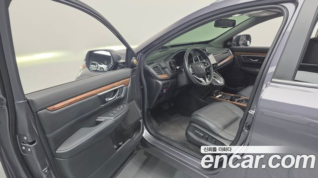 Honda CR-V (V) 2.0 Hybrid Touring 4WD 2021 — фото 10