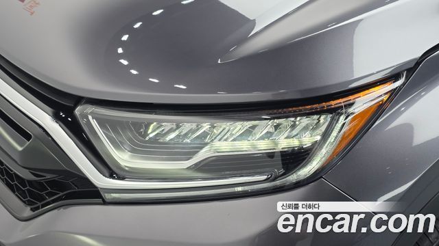 Honda CR-V (V) 2.0 Hybrid Touring 4WD 2021 — фото 22