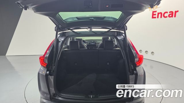 Honda CR-V (V) 2.0 Hybrid Touring 4WD 2021 — фото 31