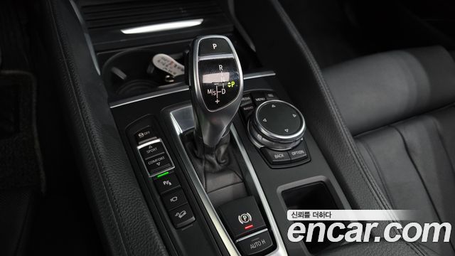 BMW X6 (F16) xDrive 40d 2016 — фото 9