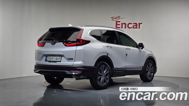 Honda CR-V (V) 2.0 Hybrid Touring 4WD 2022 — фото 2