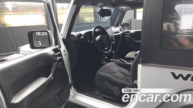 Jeep Wrangler (JK) 3.6 Sport 2Door 2016 — фото 10