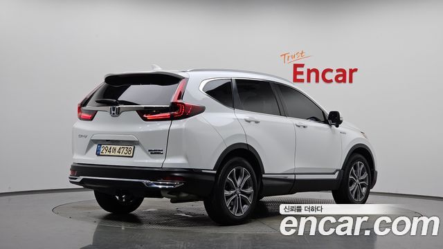 Honda CR-V (V) 2.0 Hybrid Touring 4WD 2021 — фото 2