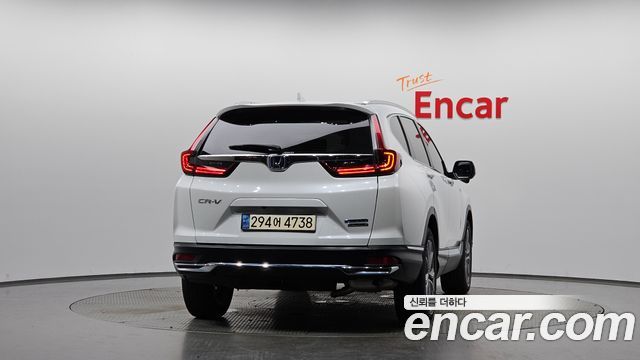 Honda CR-V (V) 2.0 Hybrid Touring 4WD 2021 — фото 4