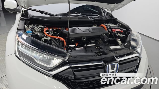Honda CR-V (V) 2.0 Hybrid Touring 4WD 2021 — фото 6
