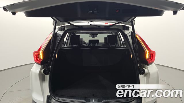Honda CR-V (V) 2.0 Hybrid Touring 4WD 2021 — фото 20