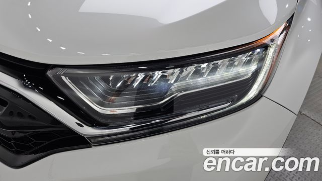 Honda CR-V (V) 2.0 Hybrid Touring 4WD 2021 — фото 22