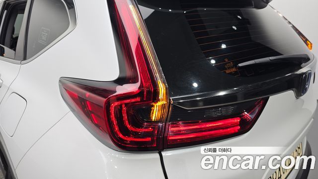 Honda CR-V (V) 2.0 Hybrid Touring 4WD 2021 — фото 23