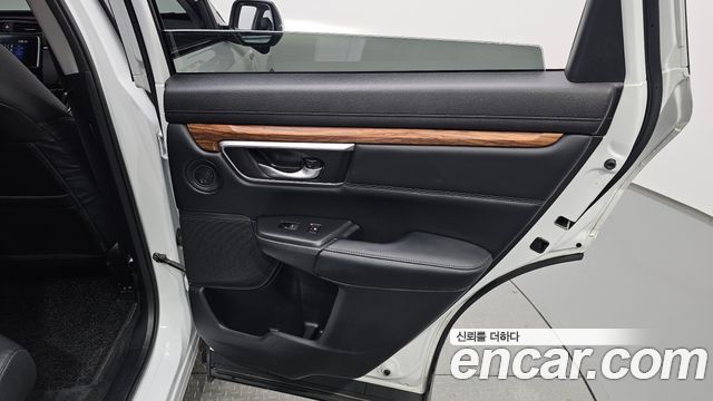 Honda CR-V (V) 2.0 Hybrid Touring 4WD 2021 — фото 25