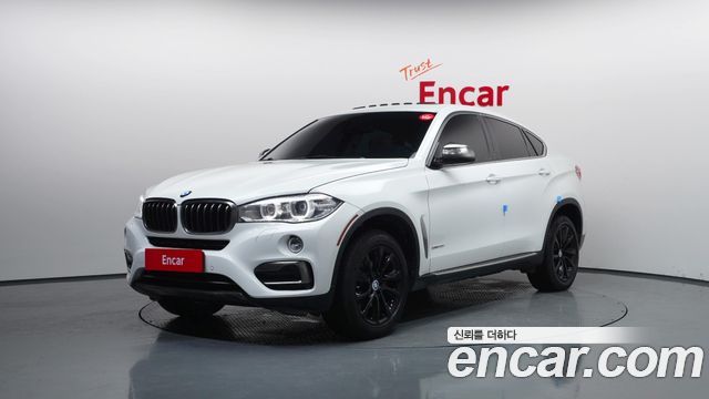 BMW X6 (F16) xDrive 35i 2015 — фото 1