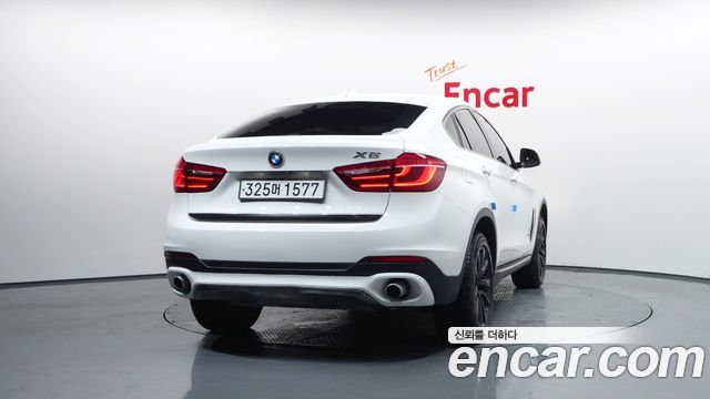 BMW X6 (F16) xDrive 35i 2015 — фото 4