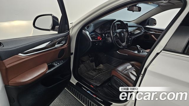 BMW X6 (F16) xDrive 35i 2015 — фото 10