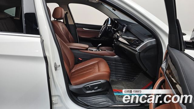 BMW X6 (F16) xDrive 35i 2015 — фото 11