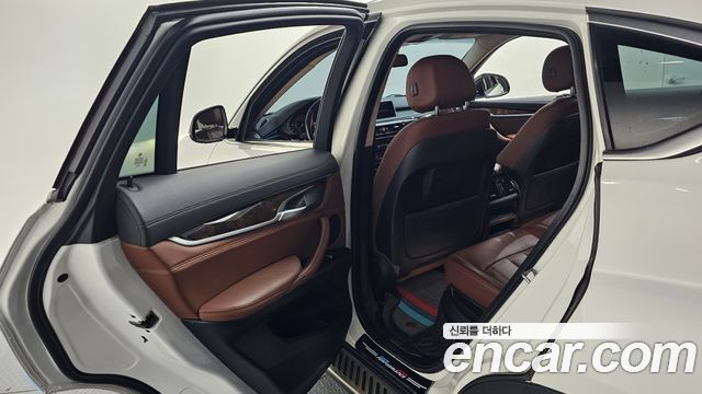 BMW X6 (F16) xDrive 35i 2015 — фото 13
