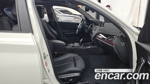 BMW 1 Series (F20) 118d Sport 5Door 2015 — фото 11