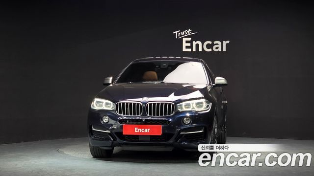 BMW X6 (F16) M50d 2015 — фото 3