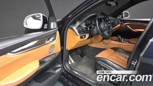 BMW X6 (F16) M50d 2015 — фото 11