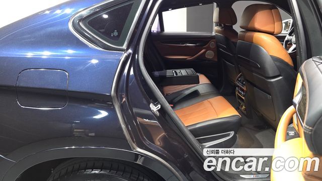BMW X6 (F16) M50d 2015 — фото 12