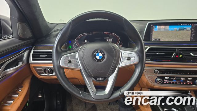 BMW 7 Series (G11) 740Li xDrive Design Pure Excellence 2020 — фото 12