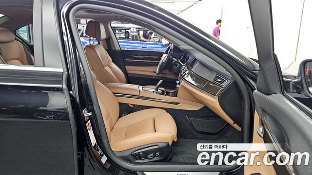 BMW 7 Series (F01) 740d xDrive 2013 — фото 11