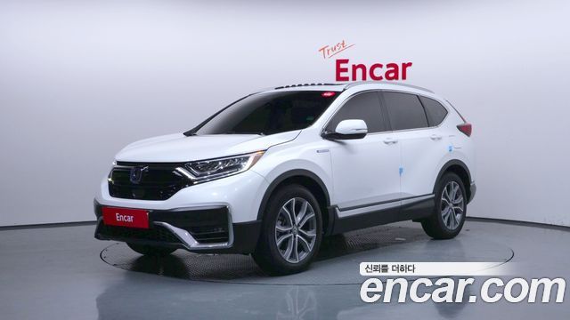 Honda CR-V (V) 2.0 Hybrid Touring 4WD 2022 — фото 1