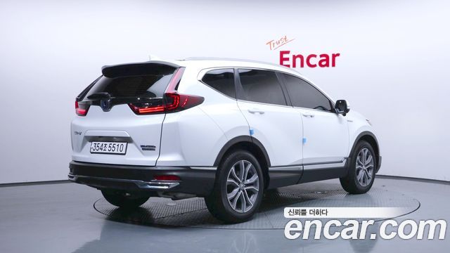 Honda CR-V (V) 2.0 Hybrid Touring 4WD 2022 — фото 2