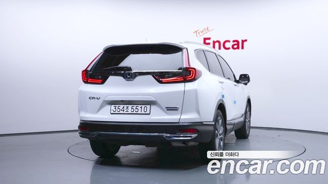Honda CR-V (V) 2.0 Hybrid Touring 4WD 2022 — фото 4