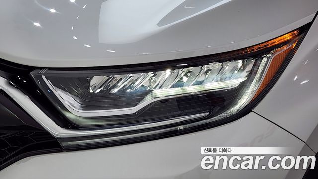 Honda CR-V (V) 2.0 Hybrid Touring 4WD 2022 — фото 22