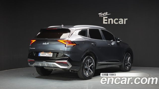 Kia Sportage Hybrid (V) Signature 4WD 2023 — фото 2
