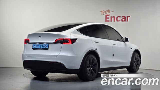 Tesla Model Y RWD 2024 — фото 2