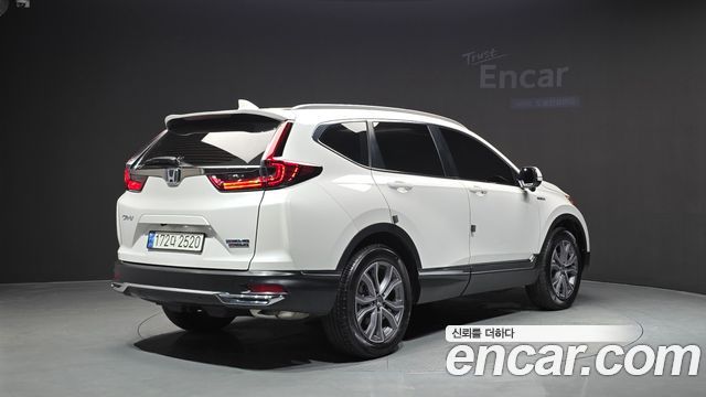 Honda CR-V (V) 2.0 Hybrid Touring 4WD 2022 — фото 2