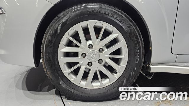 KG Mobility (SsangYong) Korando Turismo 4WD RT 11-seater 2014 — фото 5
