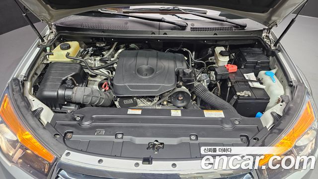 KG Mobility (SsangYong) Korando Turismo 4WD RT 11-seater 2014 — фото 6