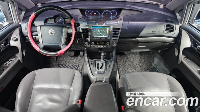KG Mobility (SsangYong) Korando Turismo 4WD RT 11-seater 2014 — фото 7
